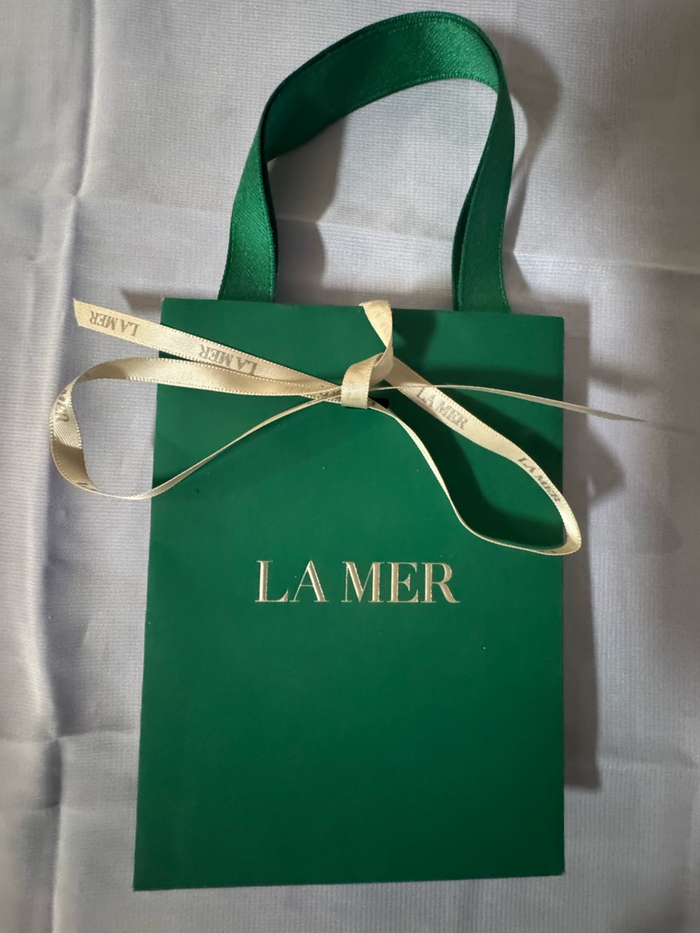La Mer 💯% Authentic Mini Green paper Shopping/Gift Bag with Branded Ribbon